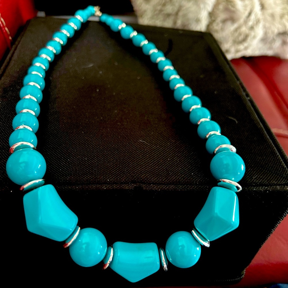 NWOT 24” turquoise genuine lucite beaded necklace. Beautiful shine. Med weight